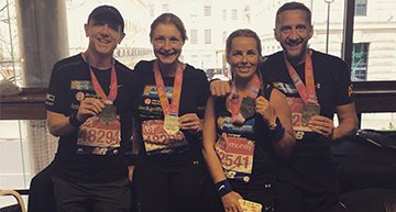 Steve Jones (Partner), Wendy Worger (Marketing Manager), Victoria Anderson (Social Media Executive) and Simon Trippett (Director) at The Property Centre with their winners medals after completing the London Marathon for charity.